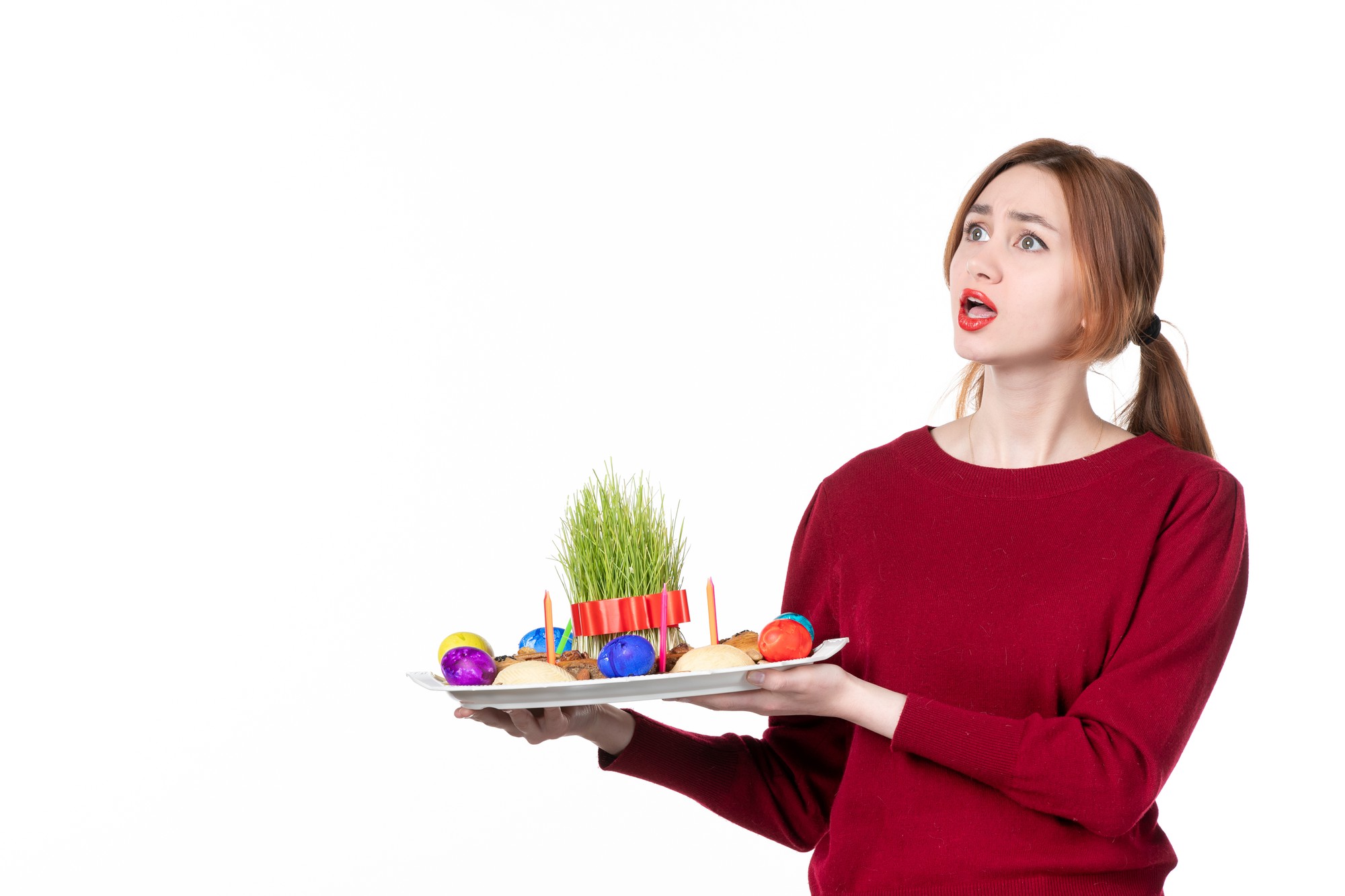 Students plating colorful salads in workshop
